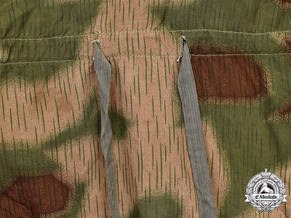 germany,_heer._a_rare_camouflage_smock_and_award_documents_to_sniper_obergefreiter_august_pamann,33_confirmed_kills_l22_mnc0319_191_1