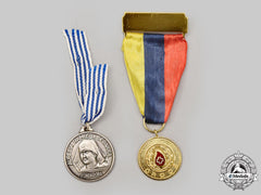Colombia, Republic; Uruguay, Republic. Two Red Cross Medals