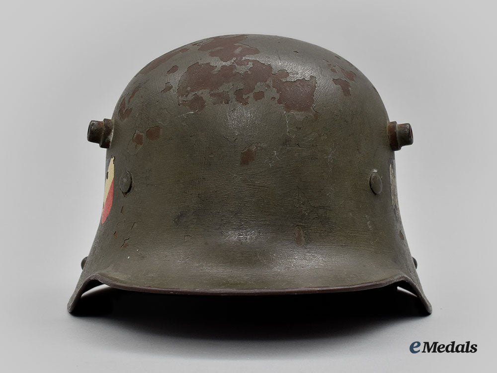 germany,_heer._an_m16_transitional_steel_helmet,_named_and_unit-_attributed_l22_mnc0648_748_1