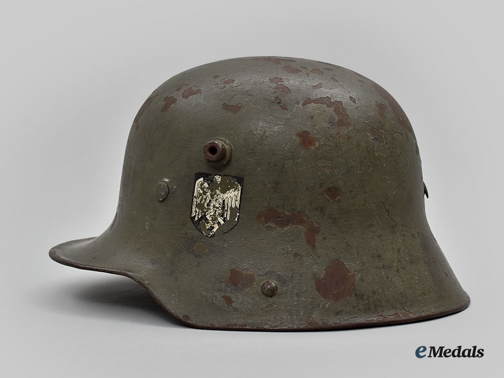 germany,_heer._an_m16_transitional_steel_helmet,_named_and_unit-_attributed_l22_mnc0651_750_1