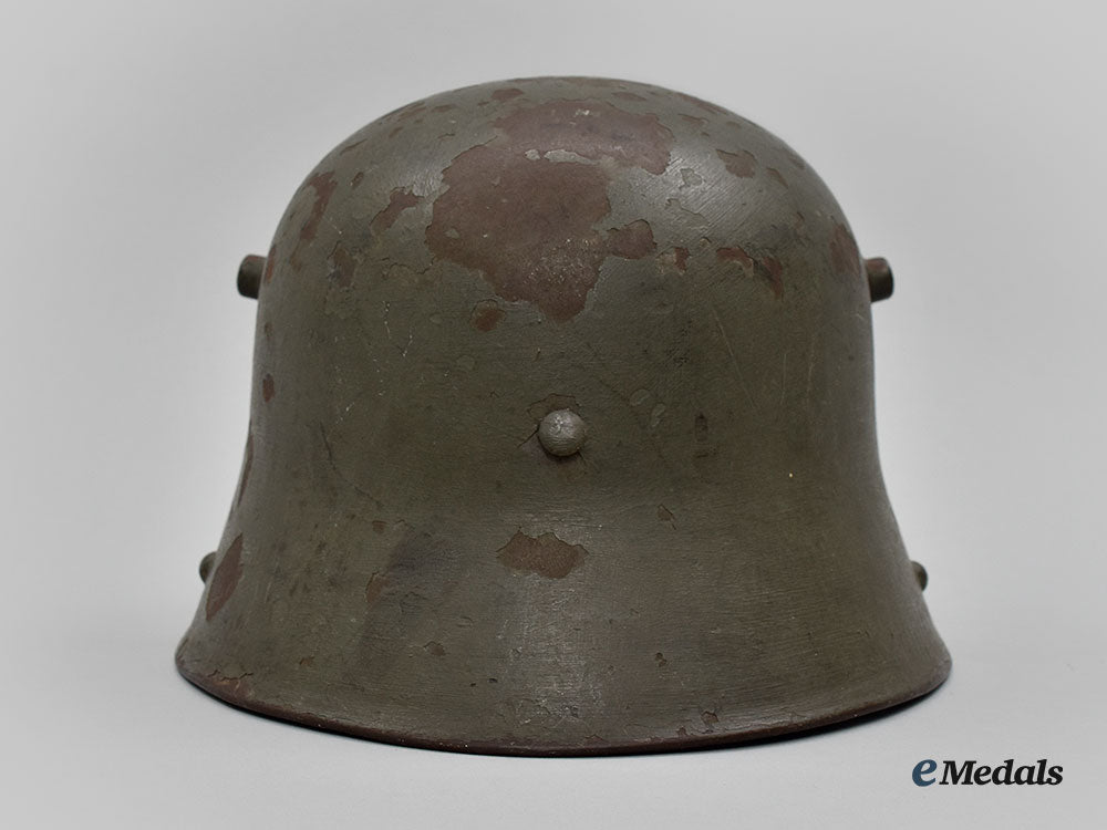 germany,_heer._an_m16_transitional_steel_helmet,_named_and_unit-_attributed_l22_mnc0653_752_1