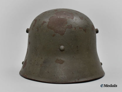 germany,_heer._an_m16_transitional_steel_helmet,_named_and_unit-_attributed_l22_mnc0653_752_1