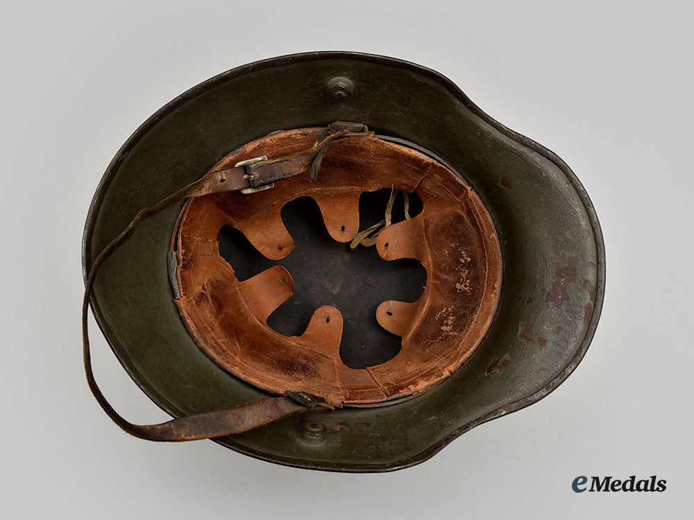 germany,_heer._an_m16_transitional_steel_helmet,_named_and_unit-_attributed_l22_mnc0659_753_1