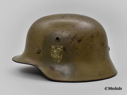 norway,_kingdom._a_repurposed_m40_steel_helmet,_by_eisenhüttenwerk_thale_l22_mnc0740_984_1