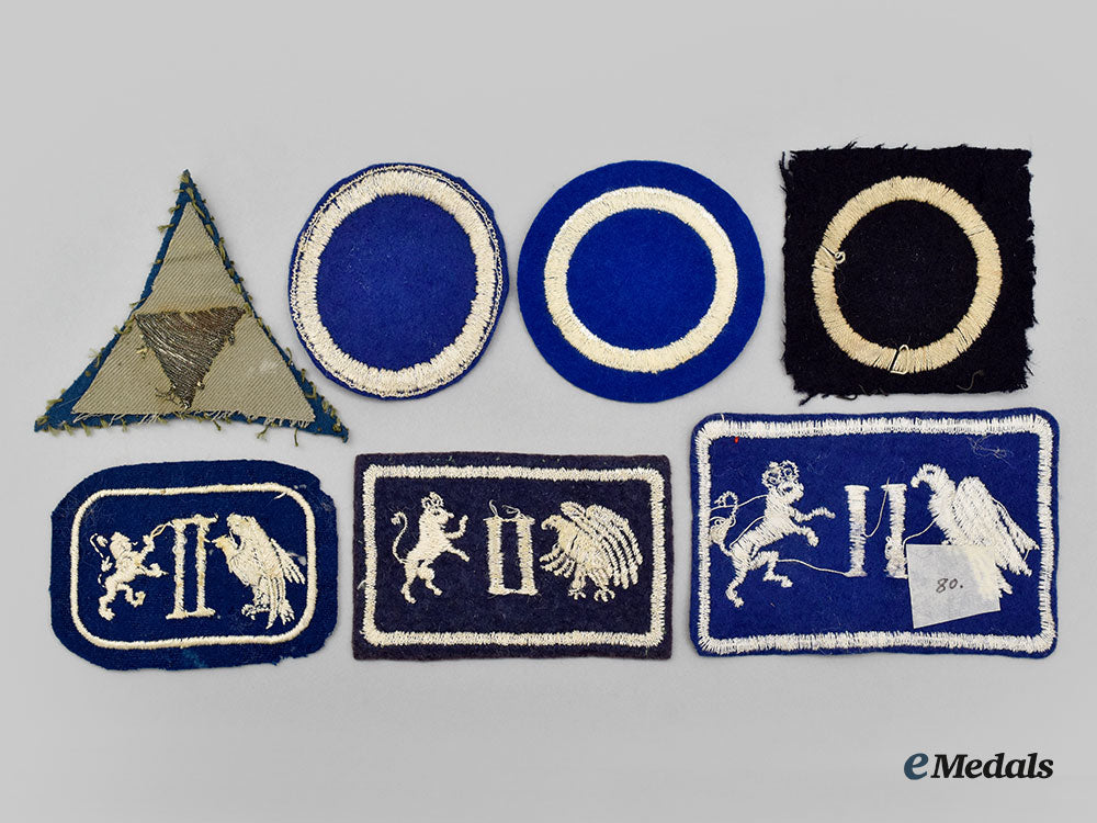 united_states._seven_first_war_aef_patches_of_the_i,_ii_and_iii_corps_l22_mnc1344_065