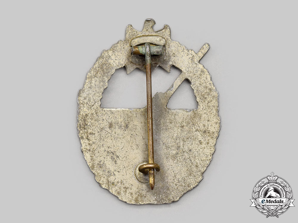 germany,_kriegsmarine._a_coastal_artillery_war_badge,_by_steinhauer&_lück_l22_mnc1520_690