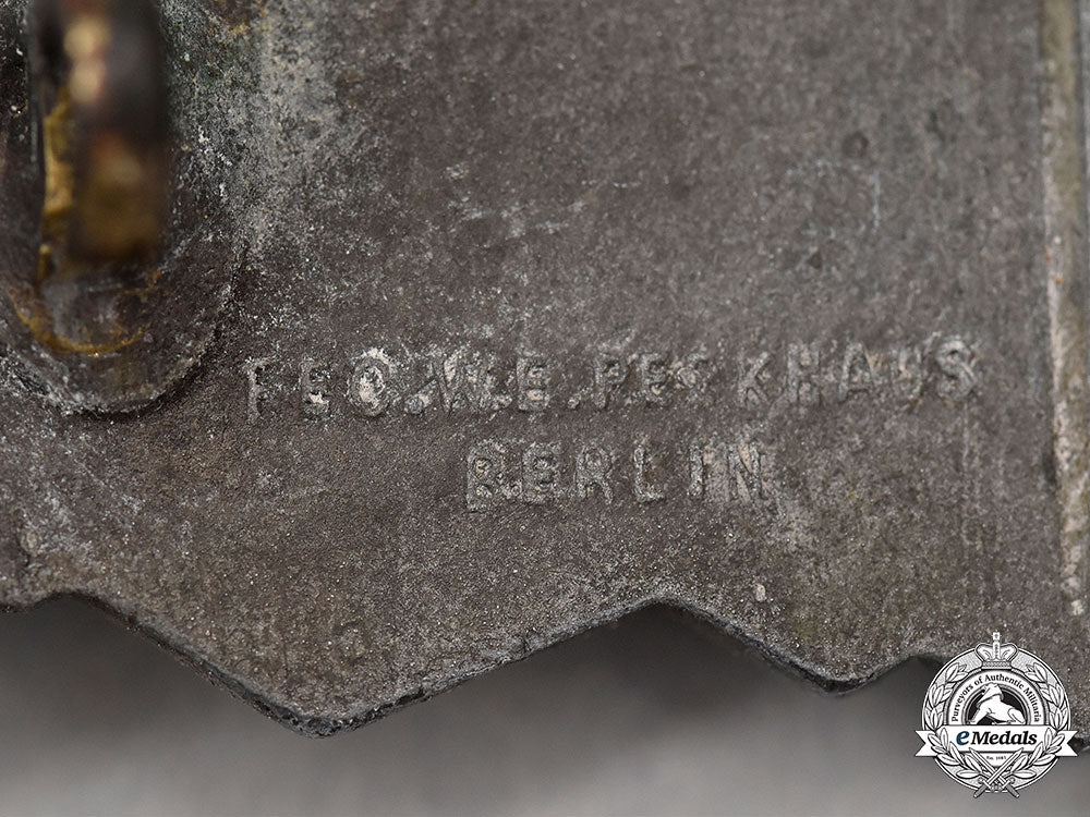 germany,_wehrmacht._a_close_combat_clasp,_silver_grade,_by_friedrich_linden_l22_mnc1641_732_1_1_1_1
