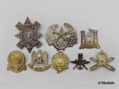 United Kingdom. A Lot Of Eight Cap Badges