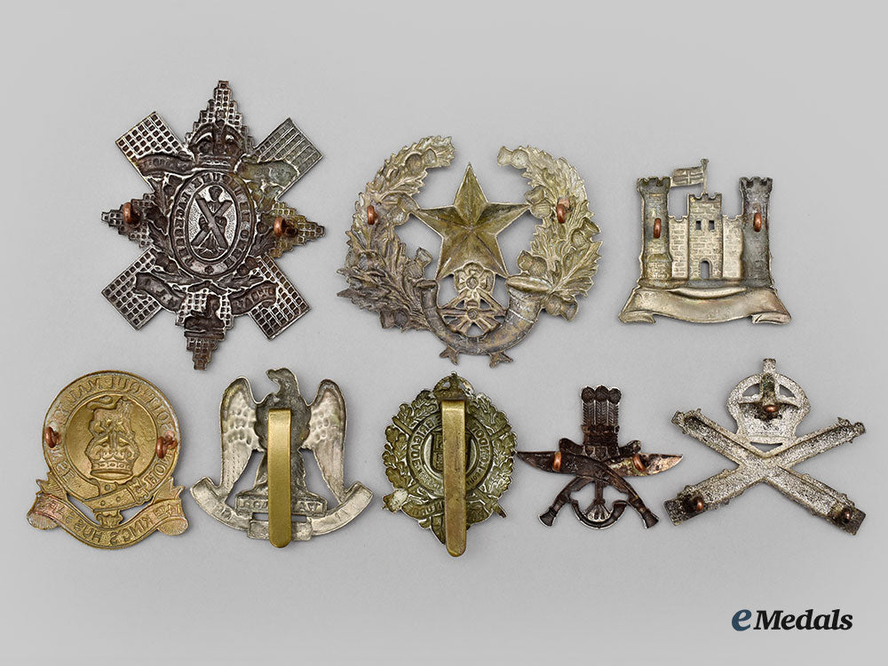 united_kingdom._a_lot_of_eight_cap_badges_l22_mnc1670_196