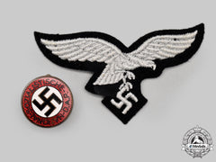 Germany, Third Reich. A Pair Of Insignia