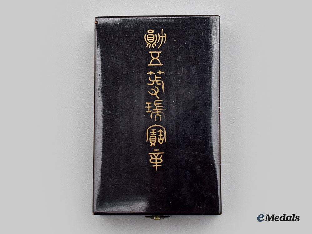 japan,_empire._an_order_of_the_sacred_treasure,_vi_class,_cased_with_award_document1944_l22_mnc1987_377_1
