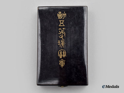 japan,_empire._an_order_of_the_sacred_treasure,_vi_class,_cased_with_award_document1944_l22_mnc1987_377_1