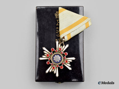 japan,_empire._an_order_of_the_sacred_treasure,_vi_class,_cased_with_award_document1944_l22_mnc1988_378_1