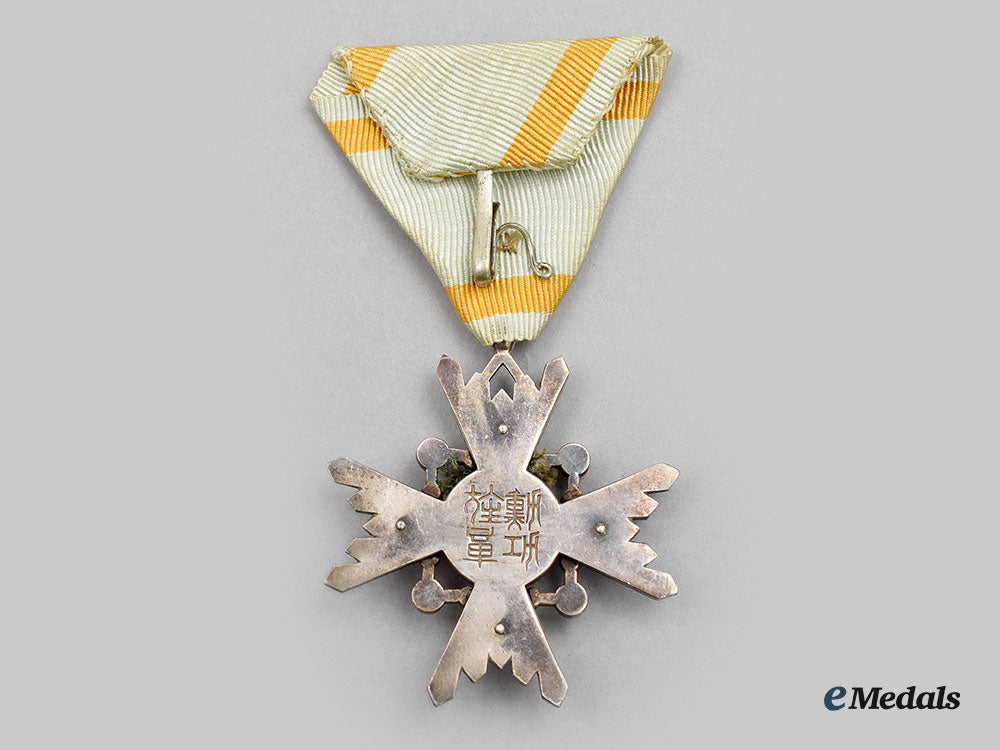 japan,_empire._an_order_of_the_sacred_treasure,_vi_class,_cased_with_award_document1944_l22_mnc1993_380_1