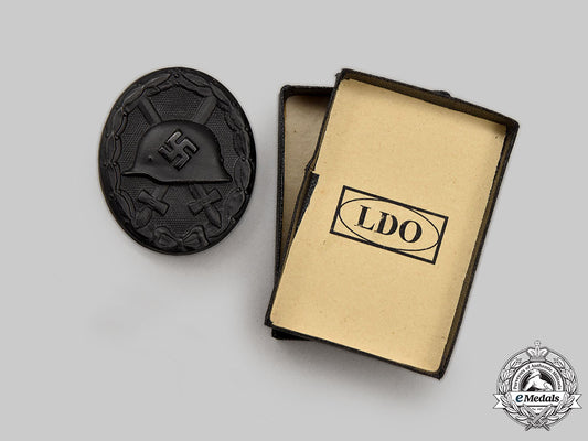 germany,_wehrmacht._a_mint_black_grade_wound_badge,_with_case_l22_mnc2002_728_1