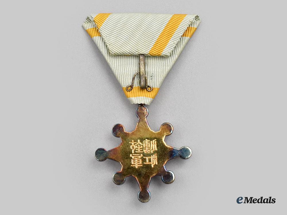 japan,_empire._an_order_of_the_sacred_treasure_vii_class,_cased_and_vi&_viii_class_award_documents_l22_mnc2075_346_1_1