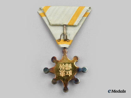 japan,_empire._an_order_of_the_sacred_treasure_vii_class,_cased_and_vi&_viii_class_award_documents_l22_mnc2075_346_1_1