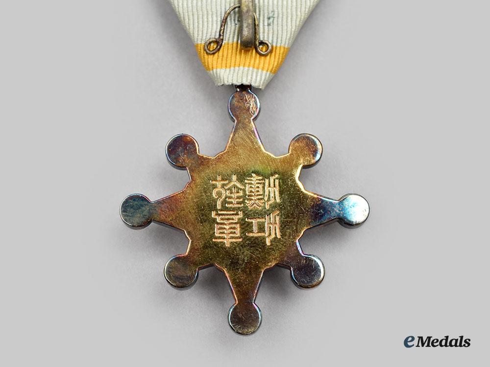 japan,_empire._an_order_of_the_sacred_treasure_vii_class,_cased_and_vi&_viii_class_award_documents_l22_mnc2077_347_1_1