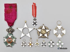 International. A Lot Of Nine Assorted Medal And Award Parts