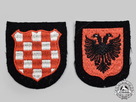 germany,_ss._a_pair_of_waffen-_ss_foreign_volunteer_sleeve_shields_l22_mnc2389_236