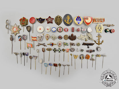international._a_lot_of_seventy-_six_assorted_insignia_l22_mnc2656_338