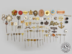 International. A Lot Of Seventy-Six Assorted Insignia