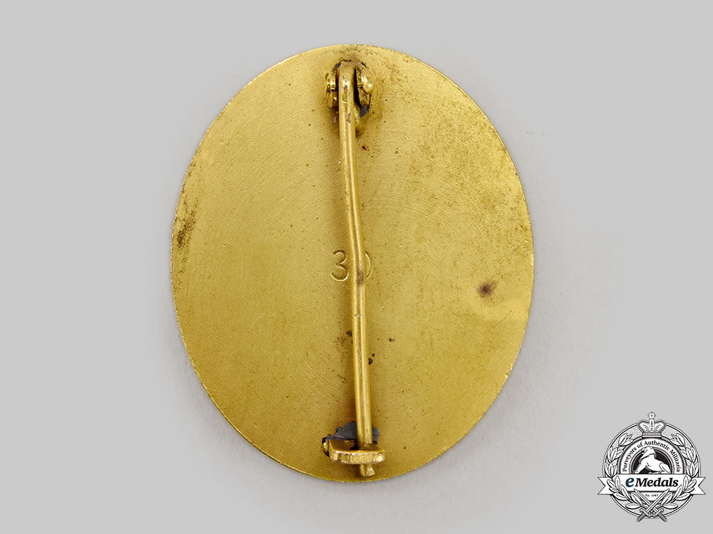 germany,_wehrmacht._a_mint_gold_grade_wound_badge,_by_the_vienna_mint_l22_mnc2763_165