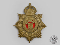 United Kingdom. A Royal Guernsey Light Infantry (Militia) Helmet Plate With King's Crown