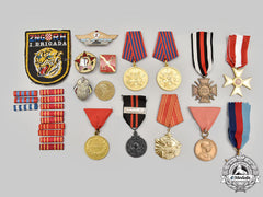 International. A Lot Of Twenty-Seven Medals, Badges And Ribbon Bars