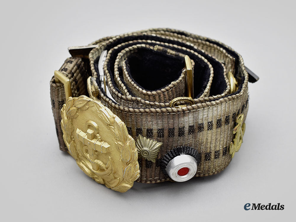 germany,_kriegsmarine._an_officer’s_brocade_and_buckle,_with_veteran-_assembled_buttons_and_insignia_l22_mnc2975_809