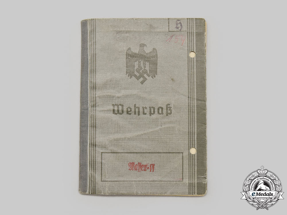 germany,_ss._a_rare_wehrpaß_to_ss-_oberscharführer_helmut_hoffmann_l22_mnc2995_407_1