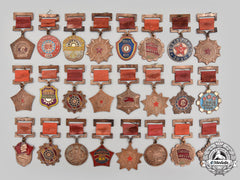 China, People's Republic. Lot Of Twenty-Four Medals