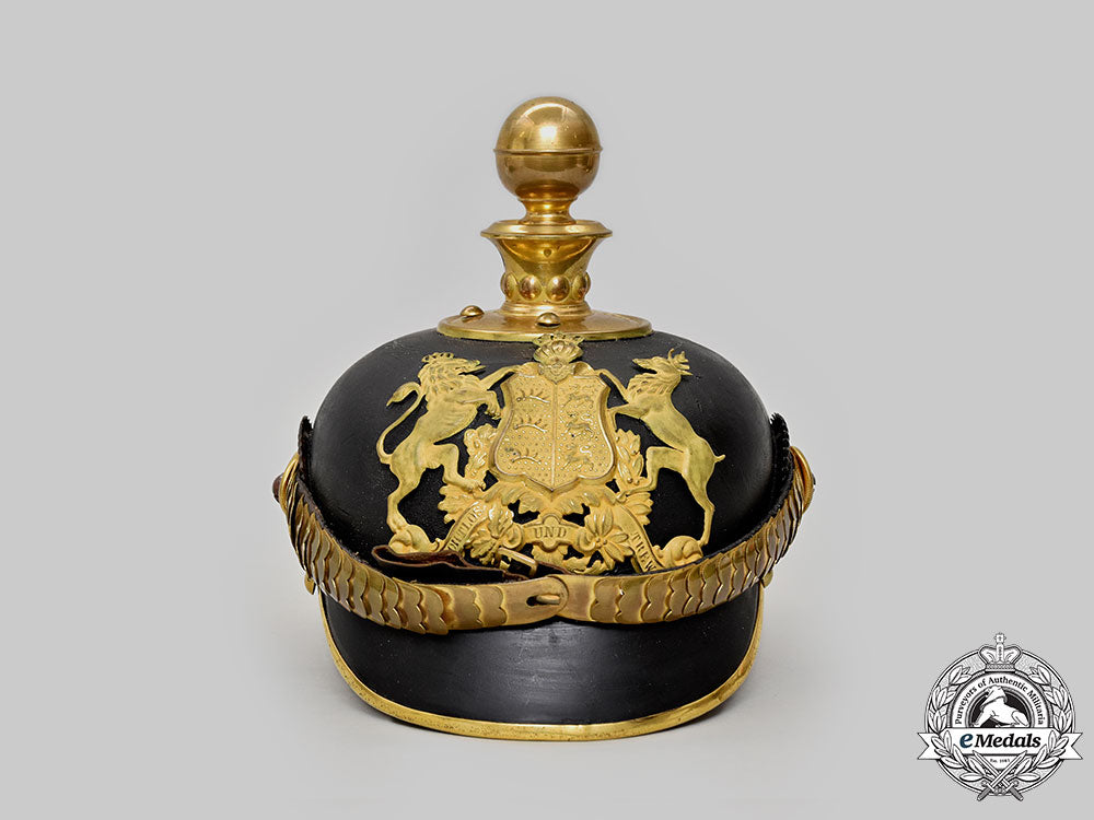 württemberg,_kingdom._a_rare_artillery_officer’s_pickelhaube_with_case_l22_mnc3423_646_1