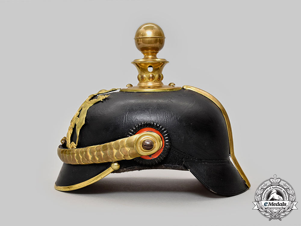 württemberg,_kingdom._a_rare_artillery_officer’s_pickelhaube_with_case_l22_mnc3424_647_1