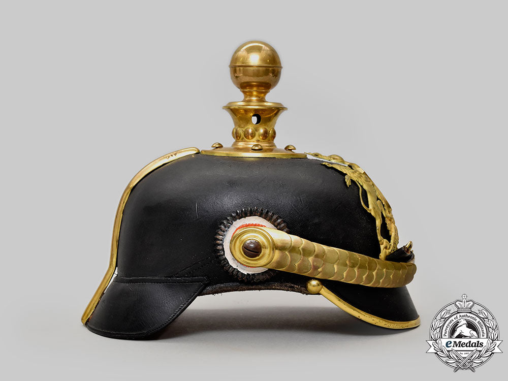 württemberg,_kingdom._a_rare_artillery_officer’s_pickelhaube_with_case_l22_mnc3425_648_1