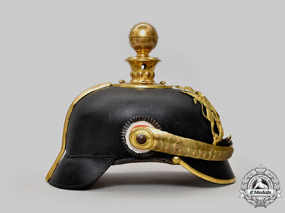 württemberg,_kingdom._a_rare_artillery_officer’s_pickelhaube_with_case_l22_mnc3425_648_1