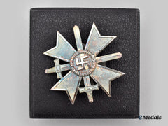 Germany, Wehrmacht. A Unissued War Merit Cross, I Class With Swords And Case, By Descheler & Son