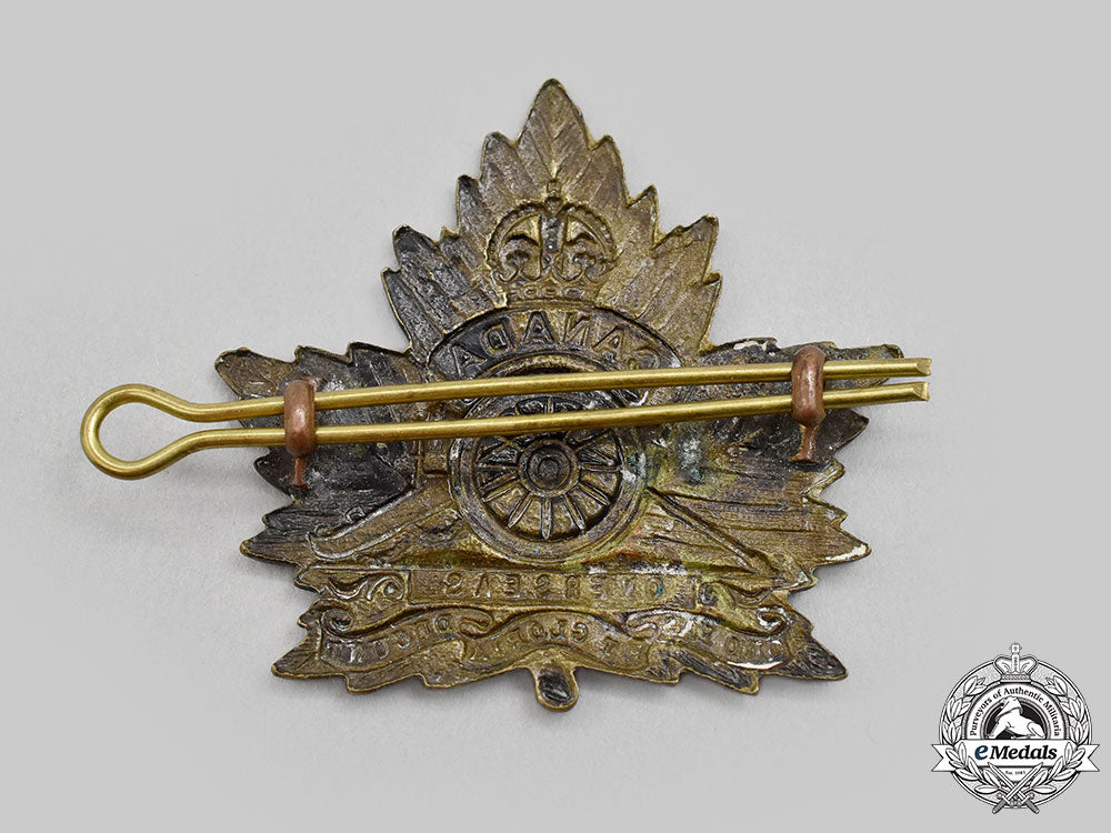 canada,_cef._a_royal_canadian_garrison_artillery_cap_badge,_style"_d"_with_maple_leaf_and"_overseas"_scroll_l22_mnc4407_273