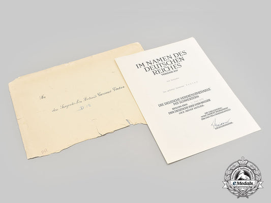 germany,_third_reich._an_award_document_for_a_merit_medal_of_the_order_of_the_german_eagle_to_artemio_carrasco_contan_l22_mnc4709_483_1_1