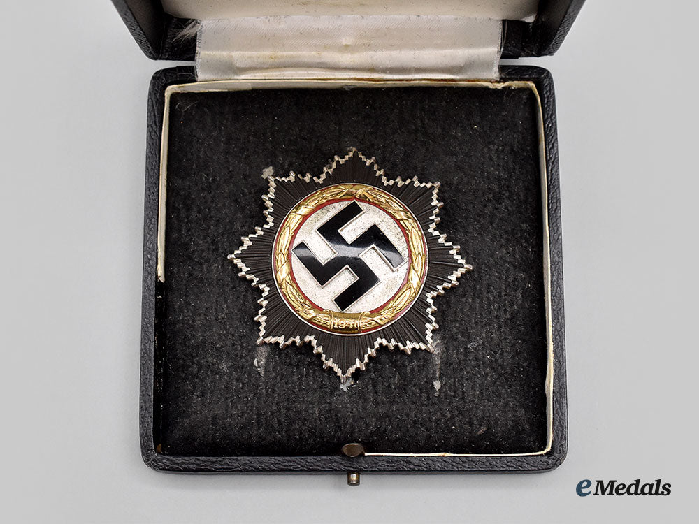 germany,_wehrmacht._a_german_cross_in_gold,_heavy_version_with_case,_by_gebrüder_godet_l22_mnc5605_951