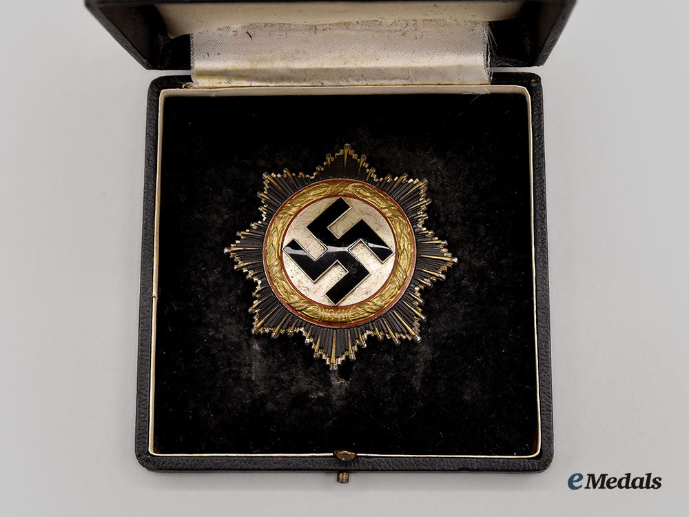 germany,_wehrmacht._a_german_cross_in_gold,_light_version_with_case,_by_c.f._zimmermann_l22_mnc5674_991