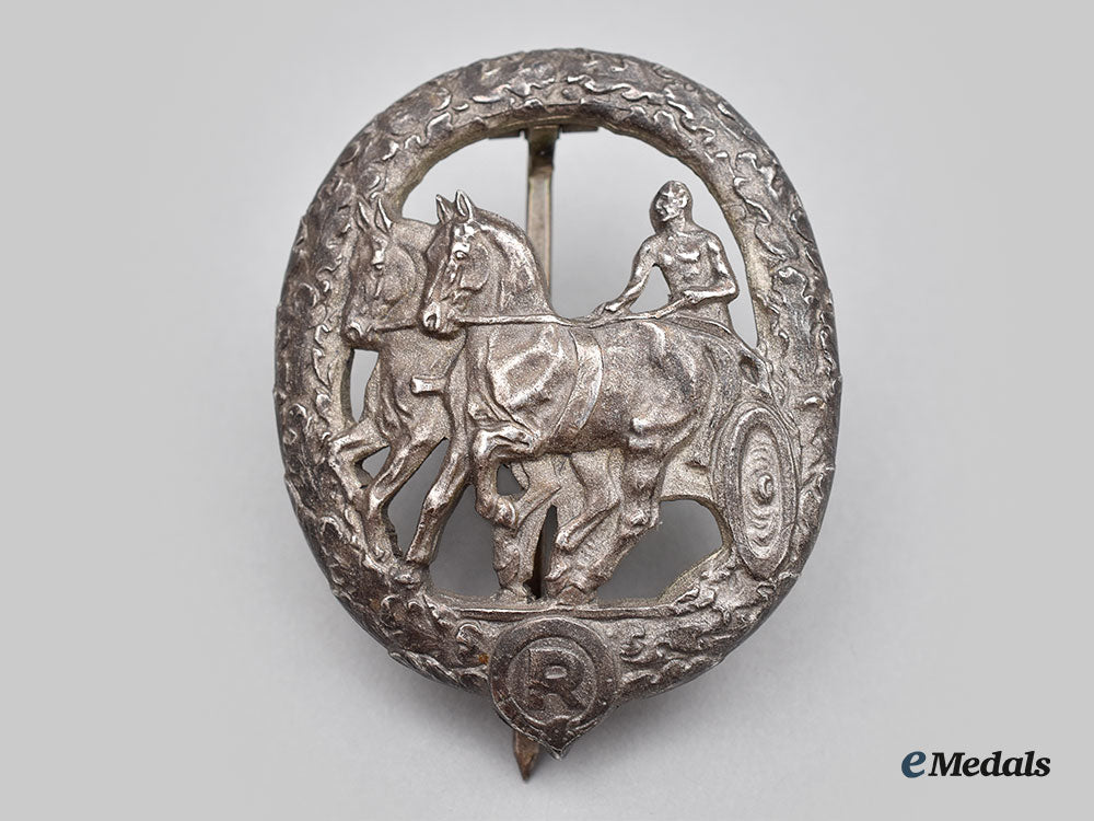 germany,_third_reich._a_german_horse_driver’s_badge,_ii_class_in_silver,_by_l._christian_lauer_l22_mnc5704_913