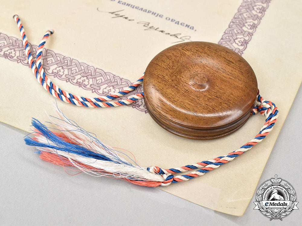 yugoslavia,_socialist_republic._a_rare_award_document_for_an_order_of_the_people’s_hero,_with_case_and_seal,_to_jna_major_lazar_markovićčađa_l22_mnc6003_766_1