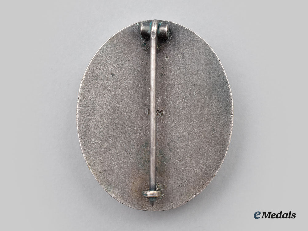 germany,_wehrmacht._a_silver_grade_wound_badge,_by_grossmann&_co._l22_mnc6249_273