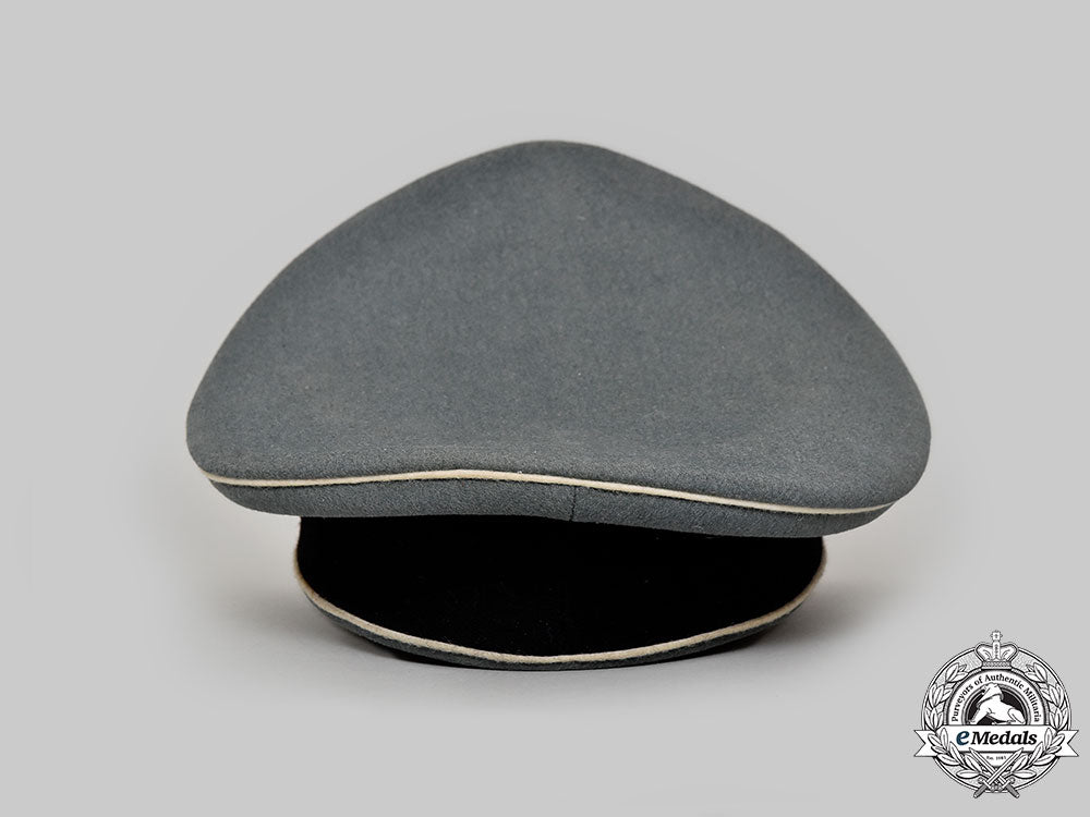 germany,_ss._a_rare_waffen-_ss_officer’s_visor_cap_with_collar_tab_totenkopf,_by_heinrich_muermann_l22_mnc6404_408