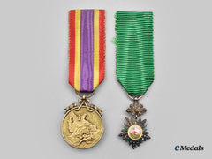 Iran, Pahlavi Empire. A Miniature Order Of The Lion And Sun And A Miniature War Medal