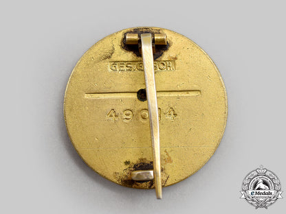 germany,_nsdap._a_golden_party_badge,_large_version,_by_deschler&_sohn_l22_mnc7131_446