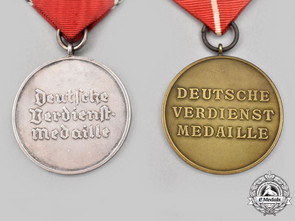 germany,_third_reich._a_pair_of_merit_medals_of_the_order_of_the_german_eagle,_bronze_and_silver_grades_l22_mnc7276_523