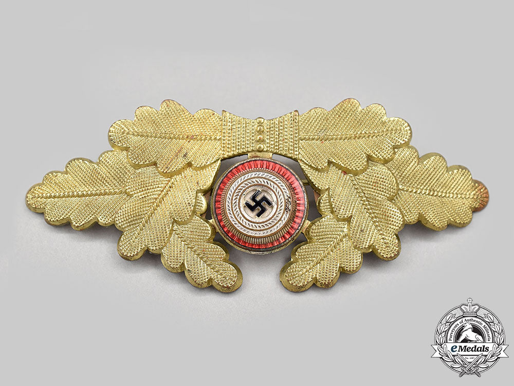 germany,_nsdap._a_political_leader’s_visor_cap_insignia_l22_mnc7516_603