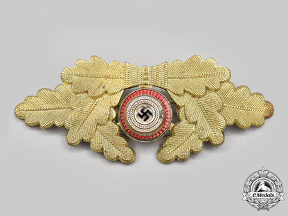 germany,_nsdap._a_political_leader’s_visor_cap_insignia_l22_mnc7516_603